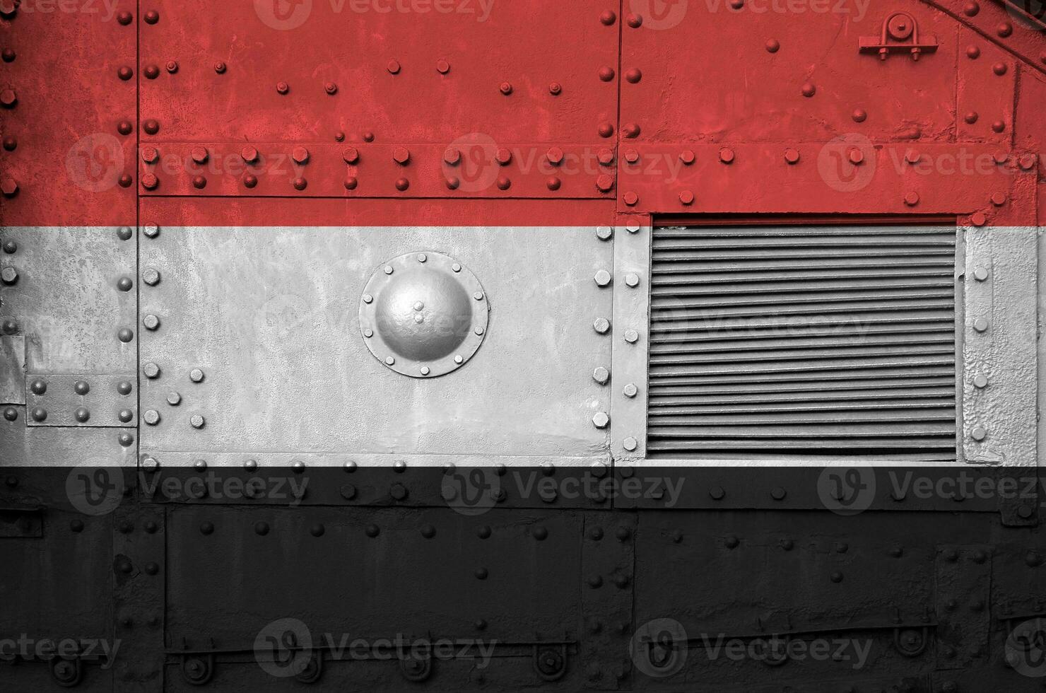 Yemen flag depicted on side part of military armored tank closeup. Army forces conceptual background photo
