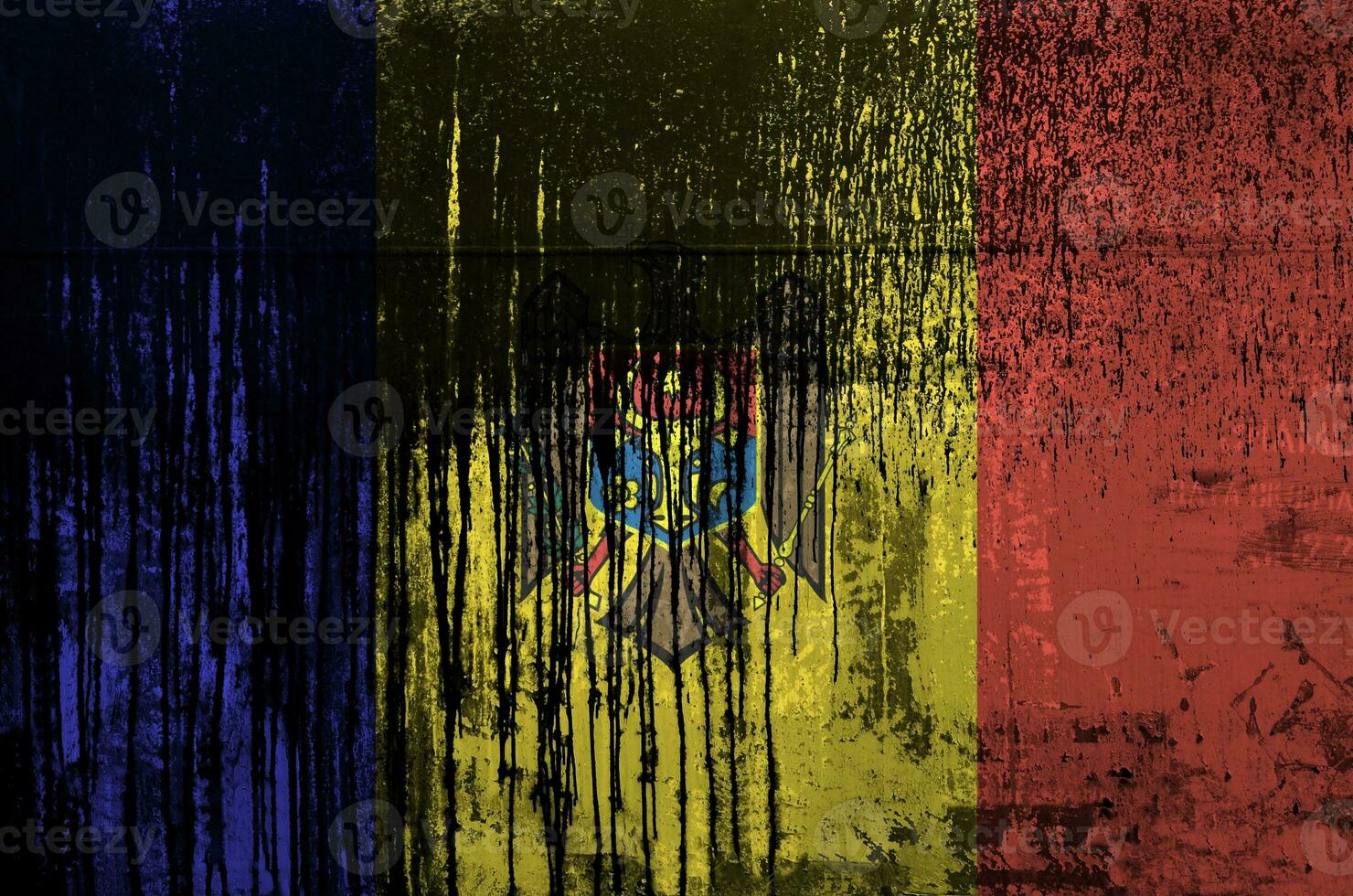 Moldova flag depicted in paint colors on old and dirty oil barrel wall closeup. Textured banner on rough background photo