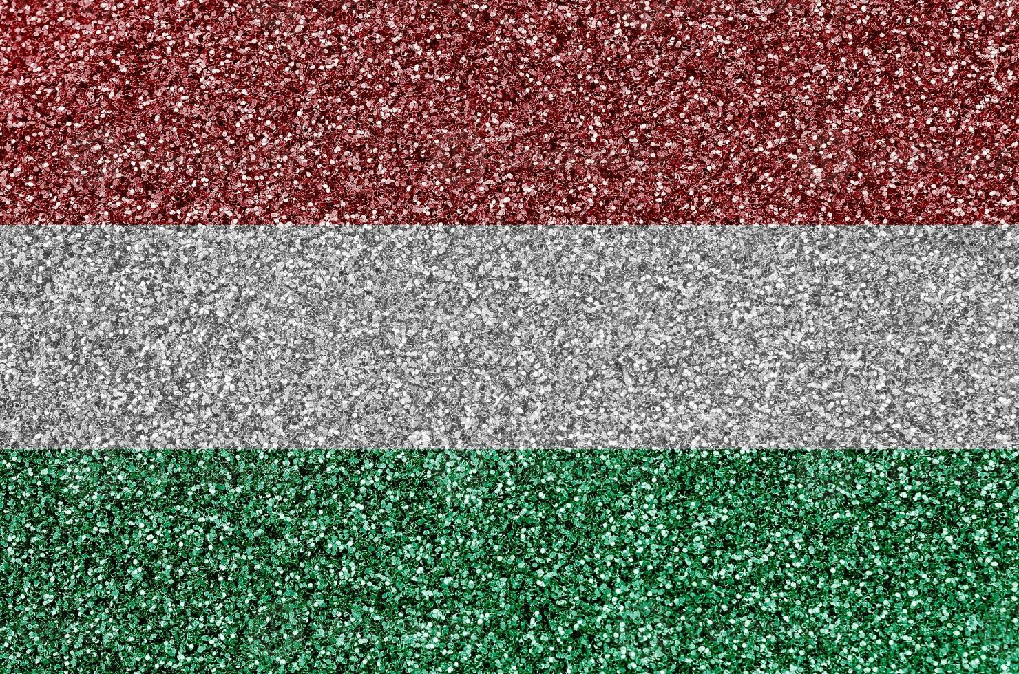 Hungría bandera representado en muchos pequeño brillante lentejuelas vistoso festival antecedentes para fiesta foto
