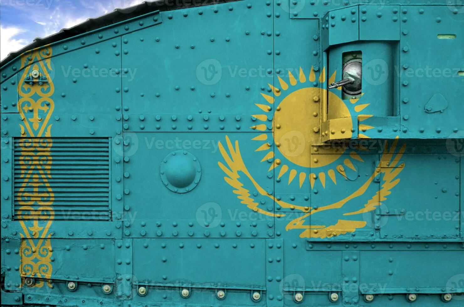 Kazakhstan flag depicted on side part of military armored tank closeup. Army forces conceptual background photo