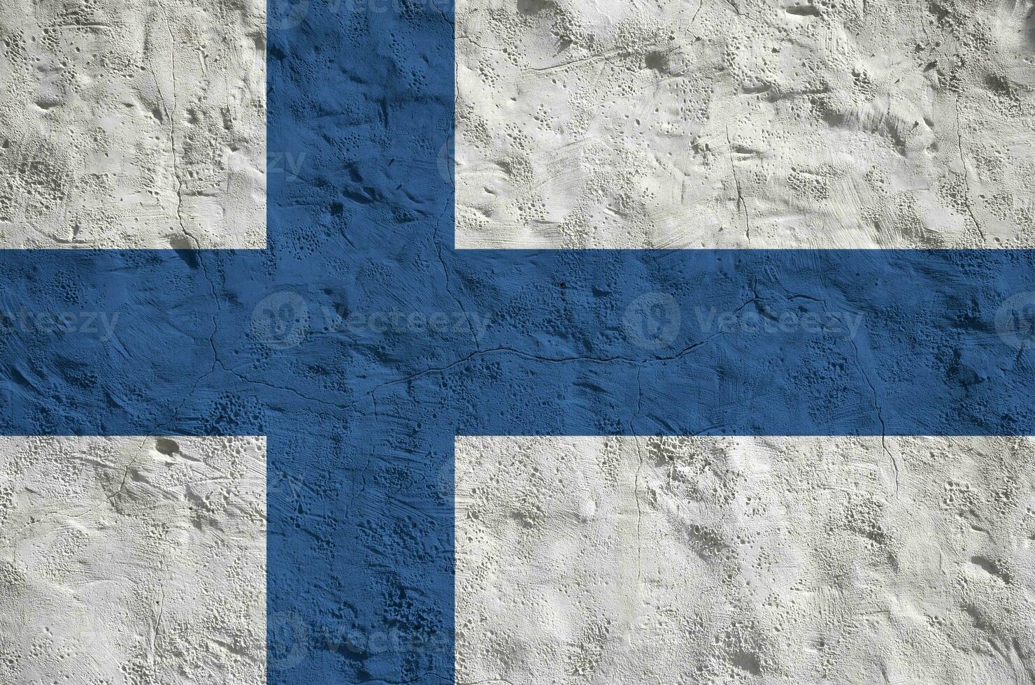 Finland flag depicted in bright paint colors on old relief plastering wall. Textured banner on rough background photo