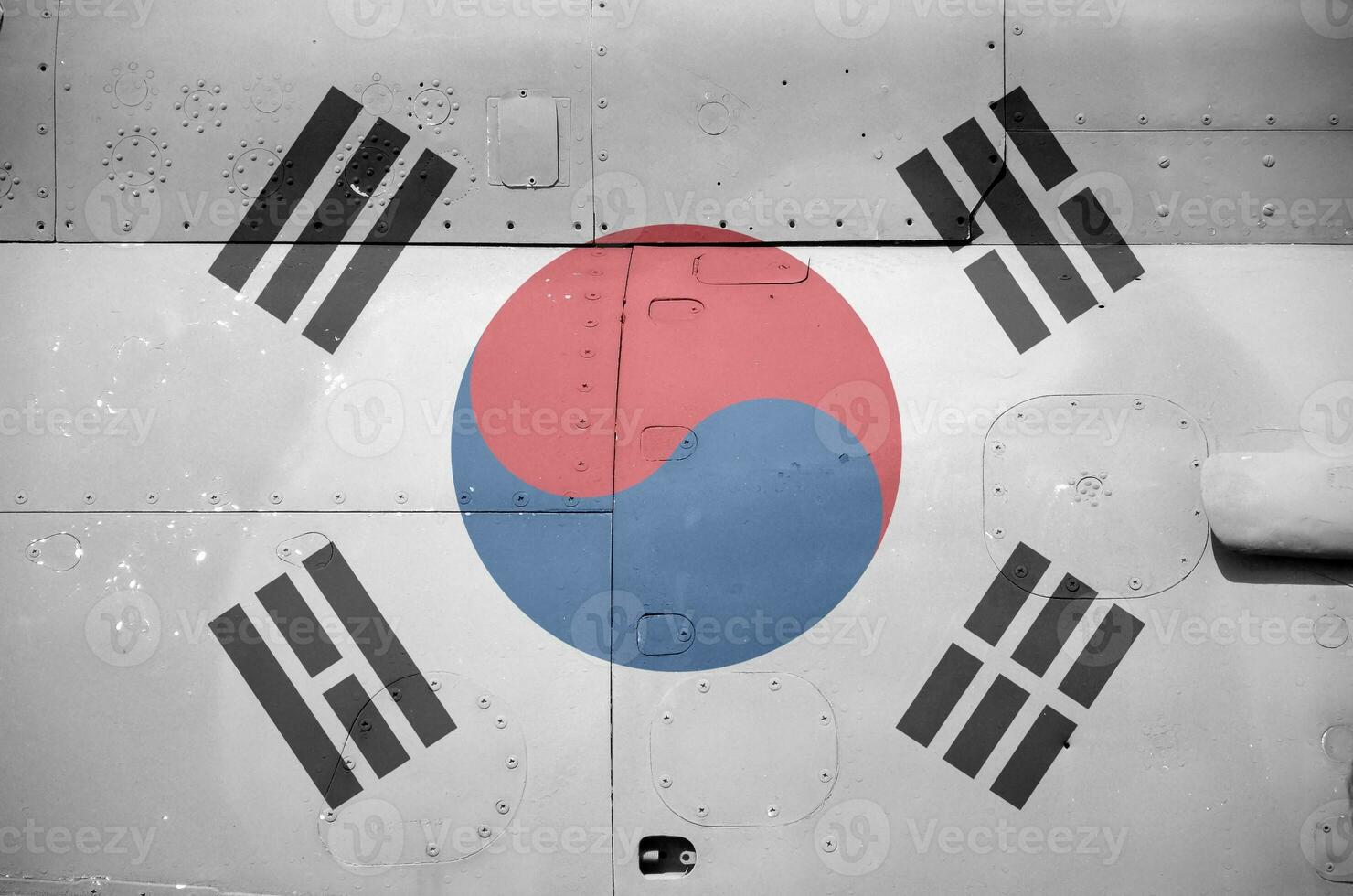 South Korea flag depicted on side part of military armored helicopter closeup. Army forces aircraft conceptual background photo