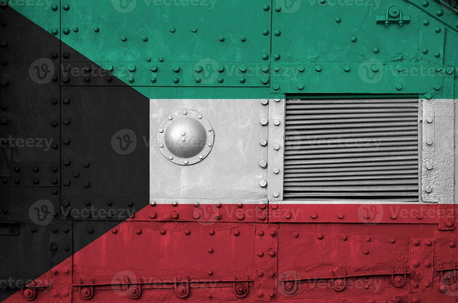 Kuwait flag depicted on side part of military armored tank closeup. Army forces conceptual background photo