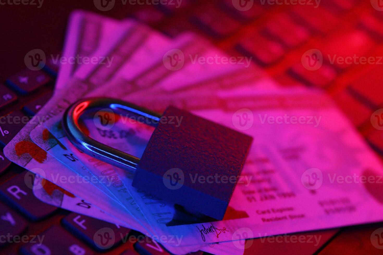 Permanent resident green card for US DV-lottery with small padlock on computer keyboard photo