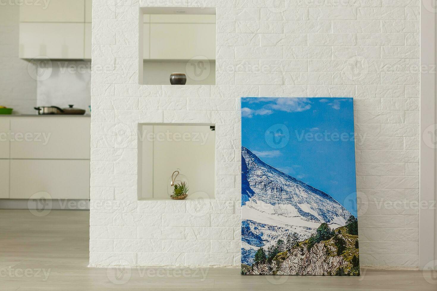 photo canvas on white brick wall collage in the interior