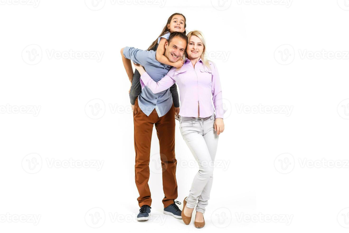 family and people concept - happy smiling mother, father and little daughter over white background photo
