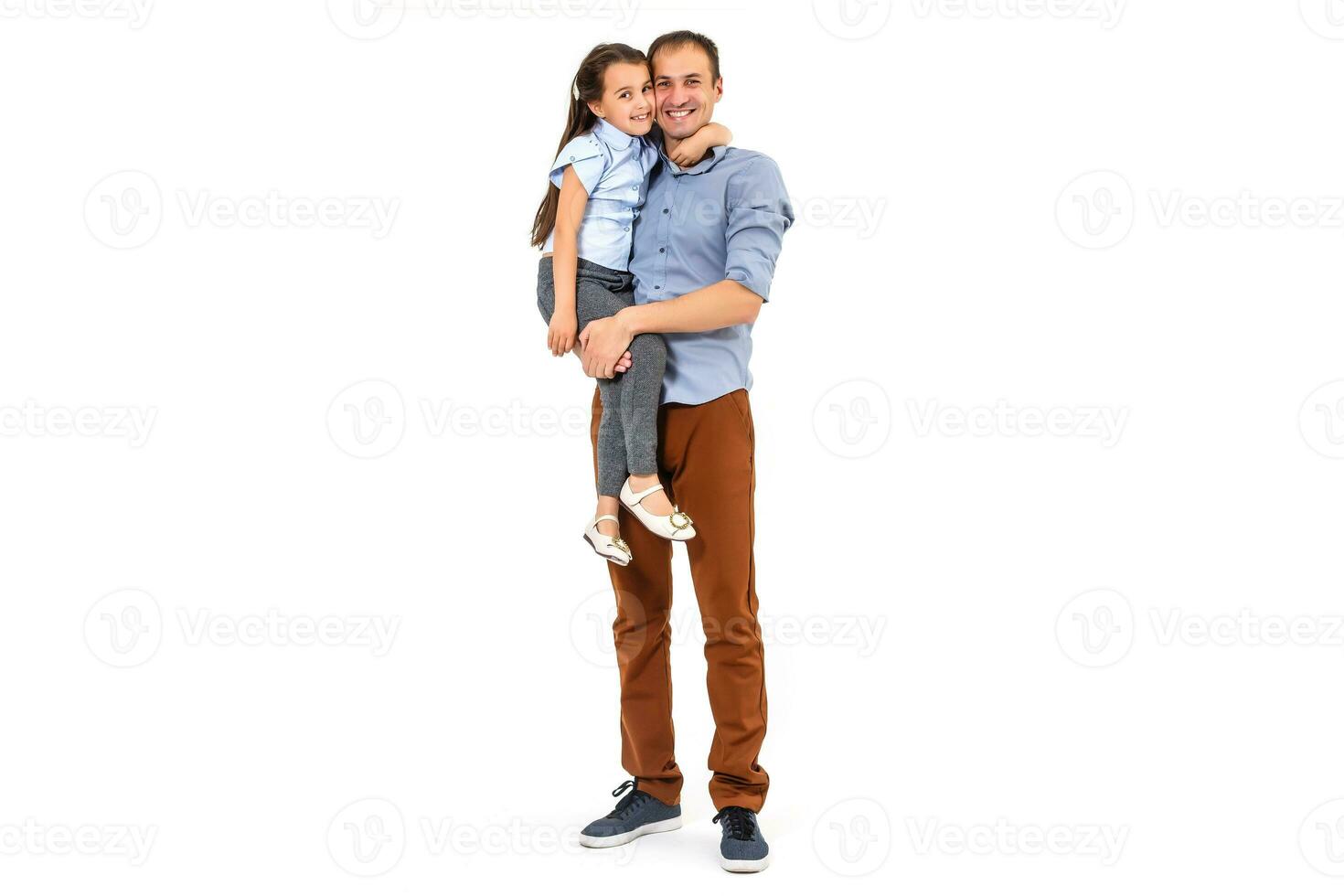 Girl hugging her father - isolated over a white background photo