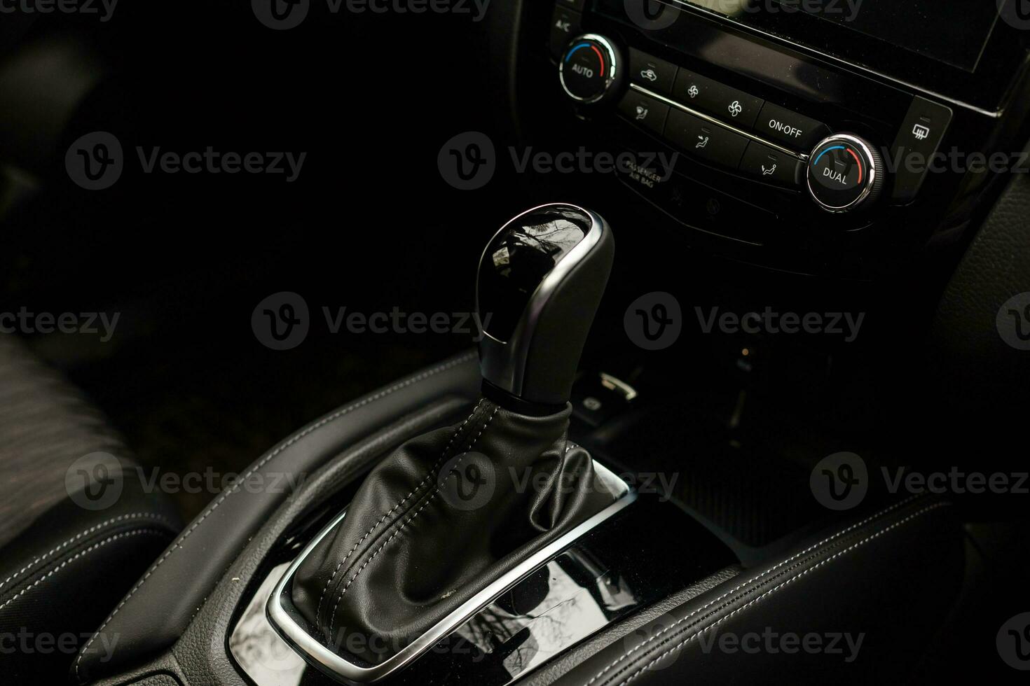 Gear shift handle in a modern car, closeup photo