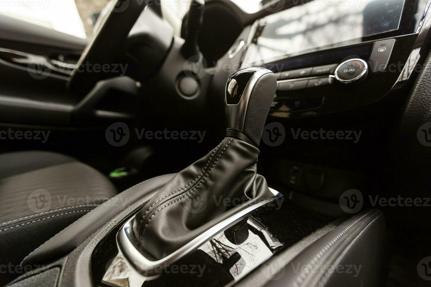 Modern car interior with dashboard and multimedia photo