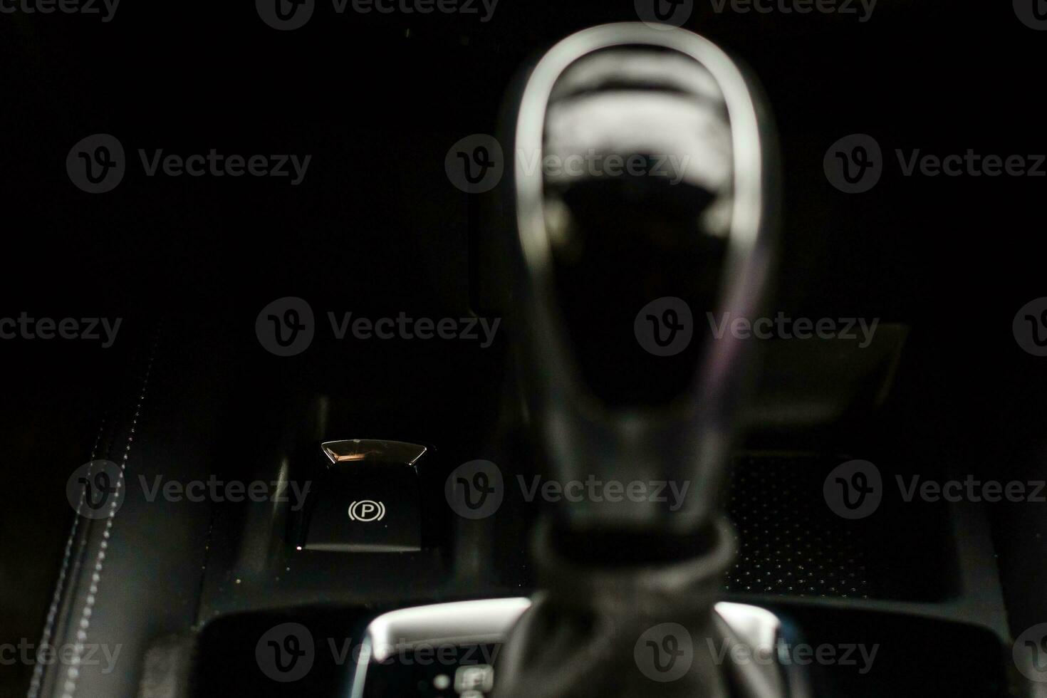 Gear shift handle in a modern car, closeup photo