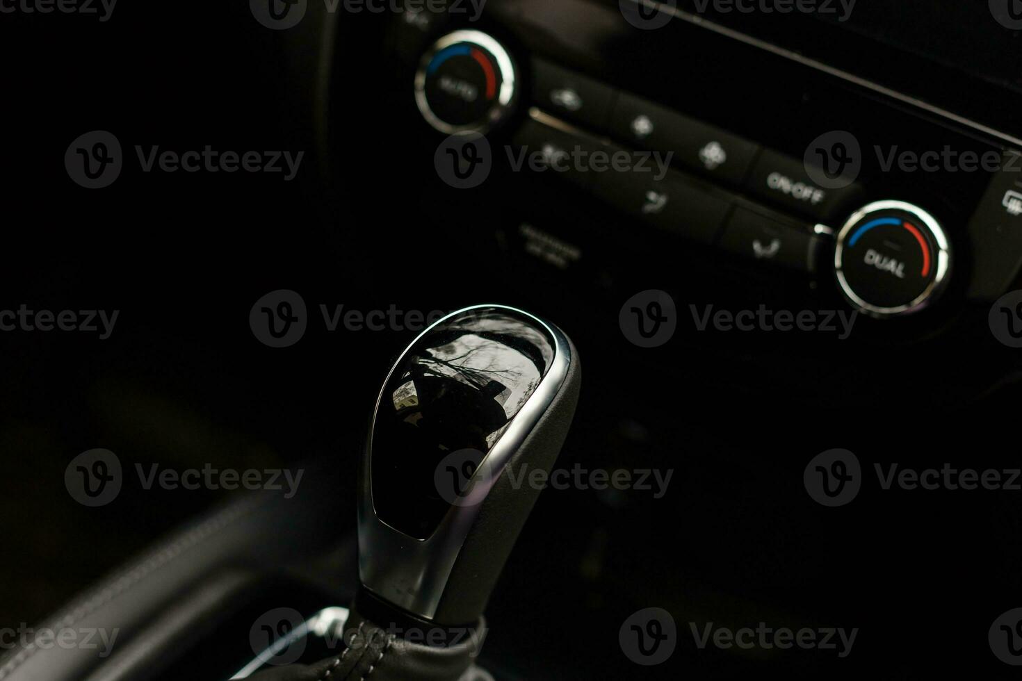 Gear shift handle in a modern car, closeup photo