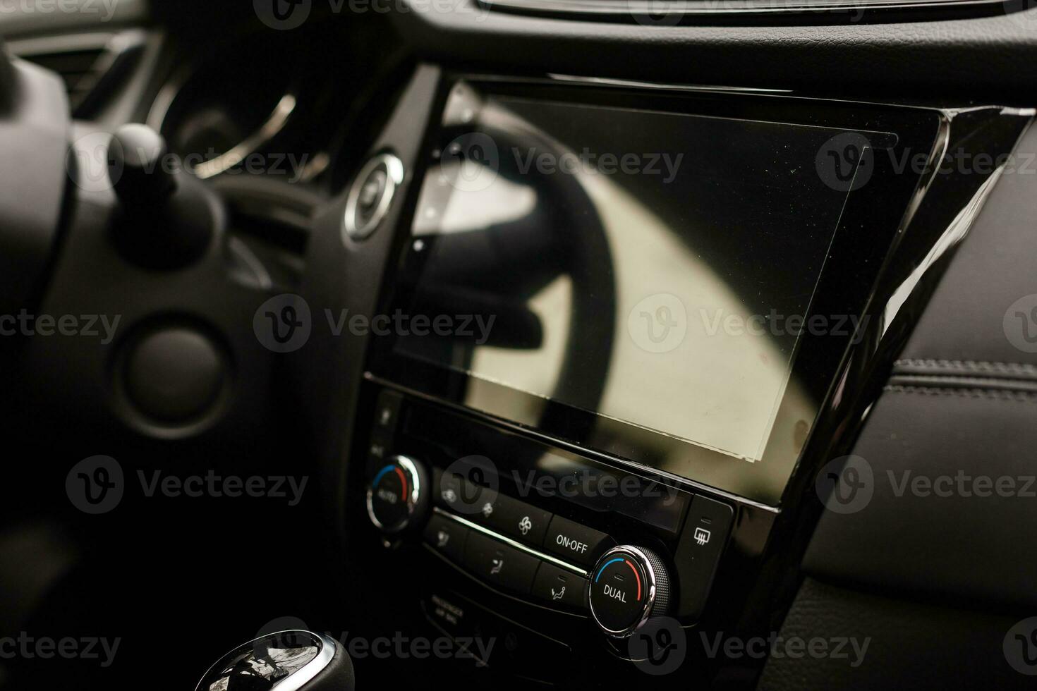 Modern car interior with dashboard and multimedia photo