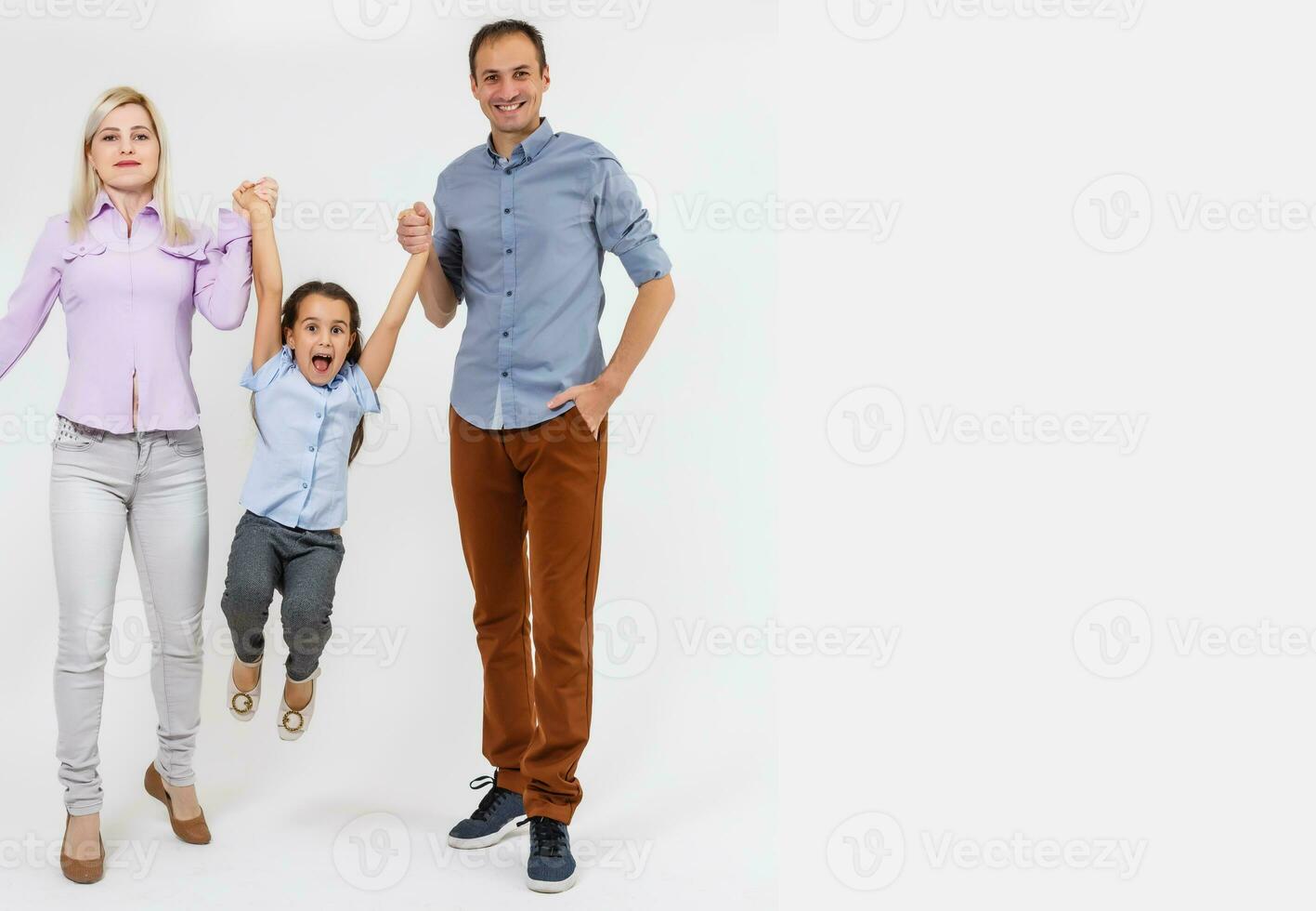 young happy family having fun on white background photo