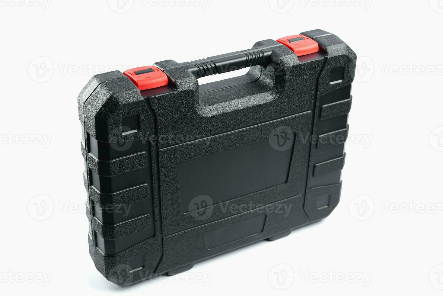 Toolbox isolated on white background. Closed black plastic case, close up photo