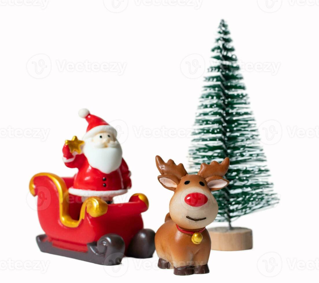 Christmas tree and Santa Claus in sleigh with reindeer isolated on white or transparent background. photo