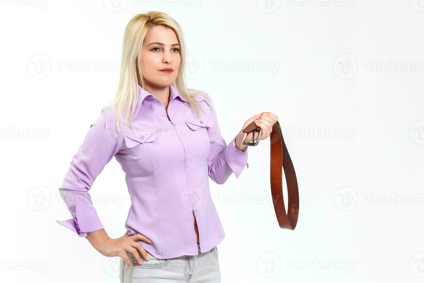 woman threatens a belt photo