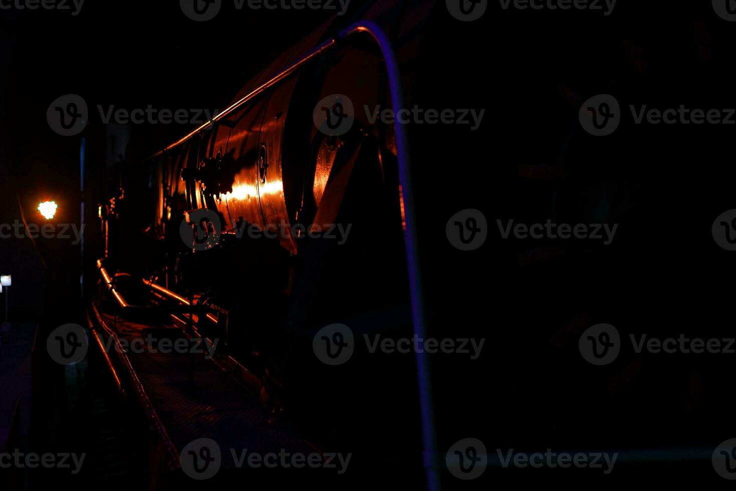 Strong connection with red train car metal coupling connected together as a business symbol of strength in partnership and an unbreakable agreement or contract between two team members. photo