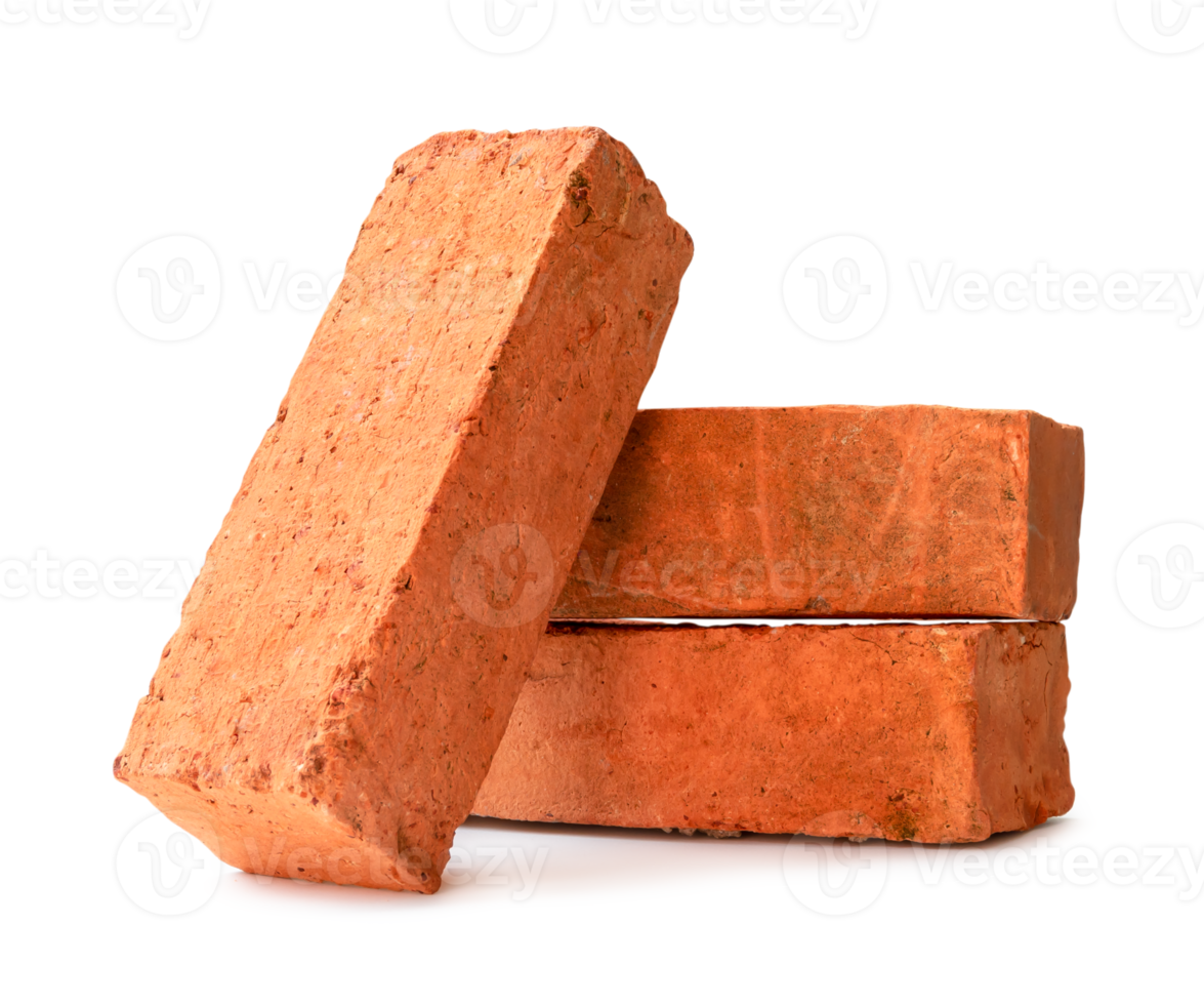 Cracked old red or orange bricks in stack isolated with clipping path and shadow in png file format