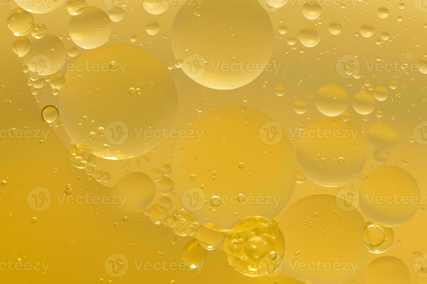 Oil bubble texture on gold background. photo