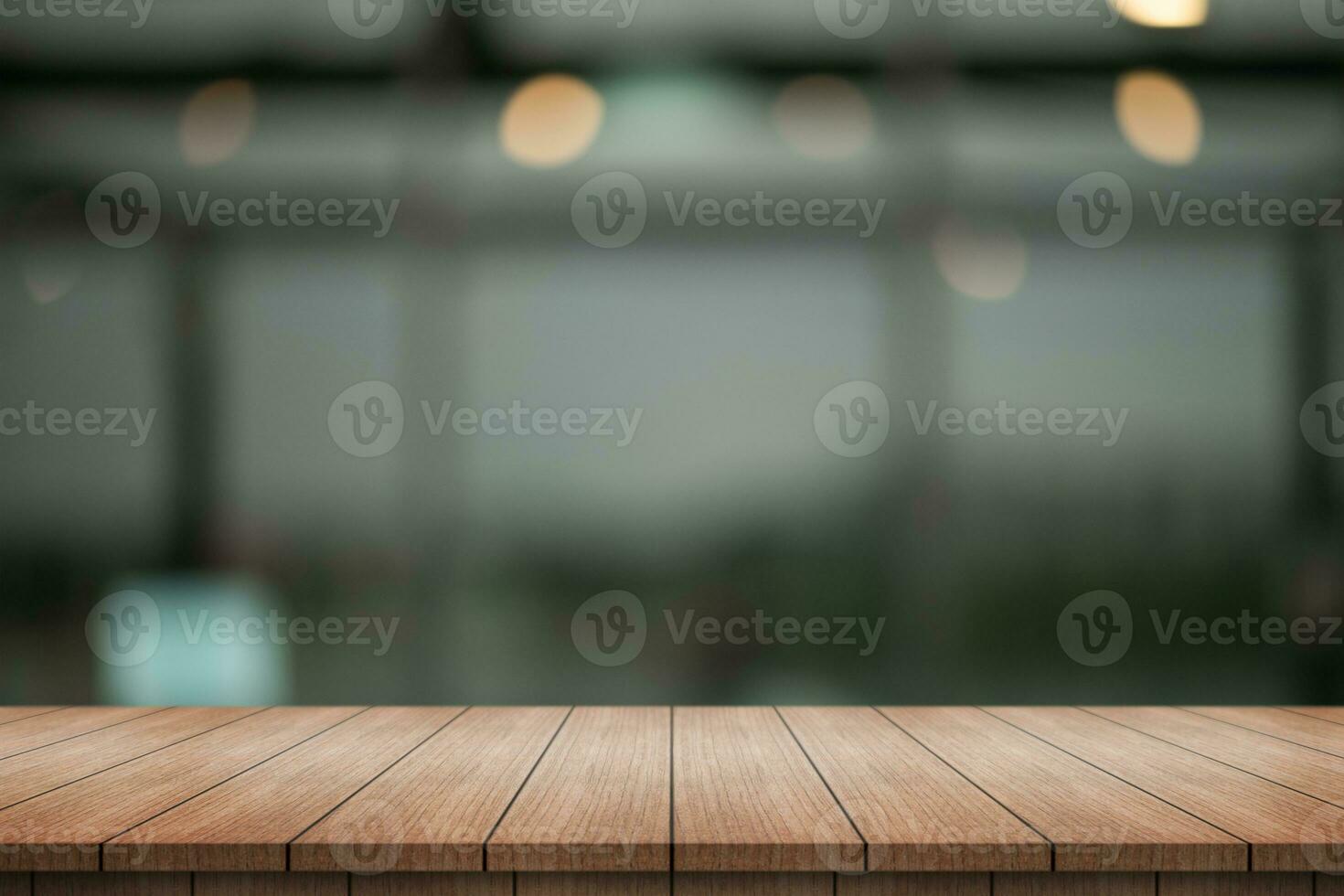 Empty wooden table top with lights bokeh on blur restaurant background. photo