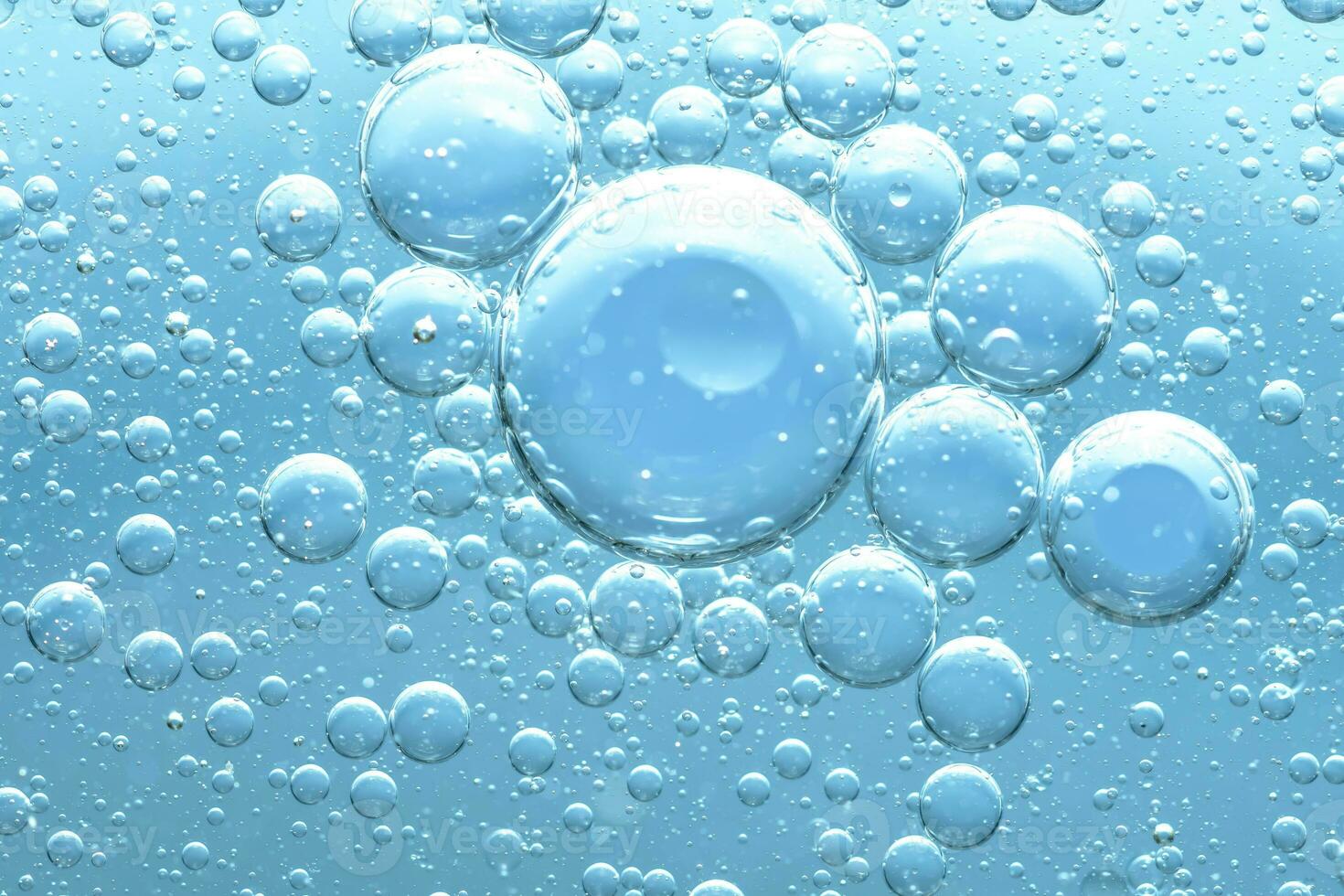 Water bubble texture on blue background photo