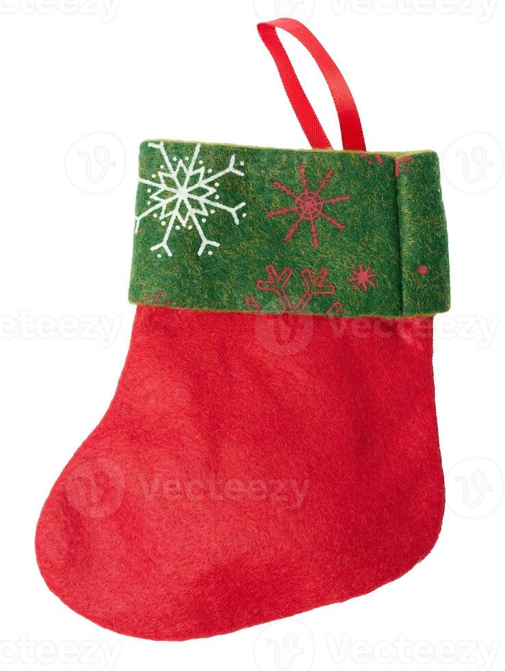 Red felt Christmas sock for gifts on a white isolated background photo