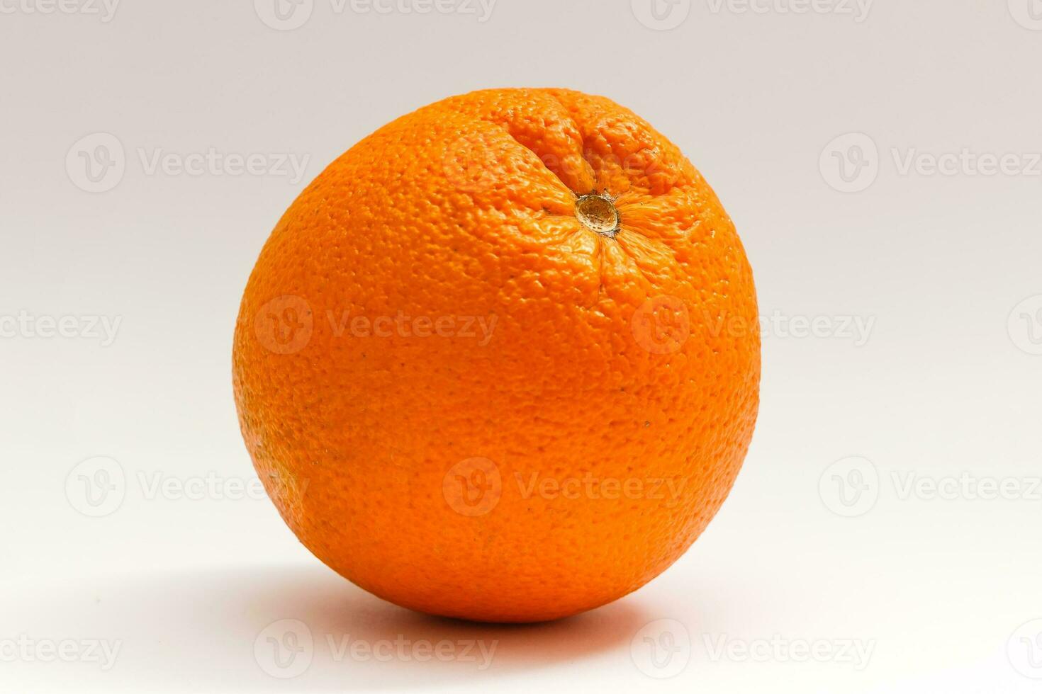 Ripe orange isolated on white background photo