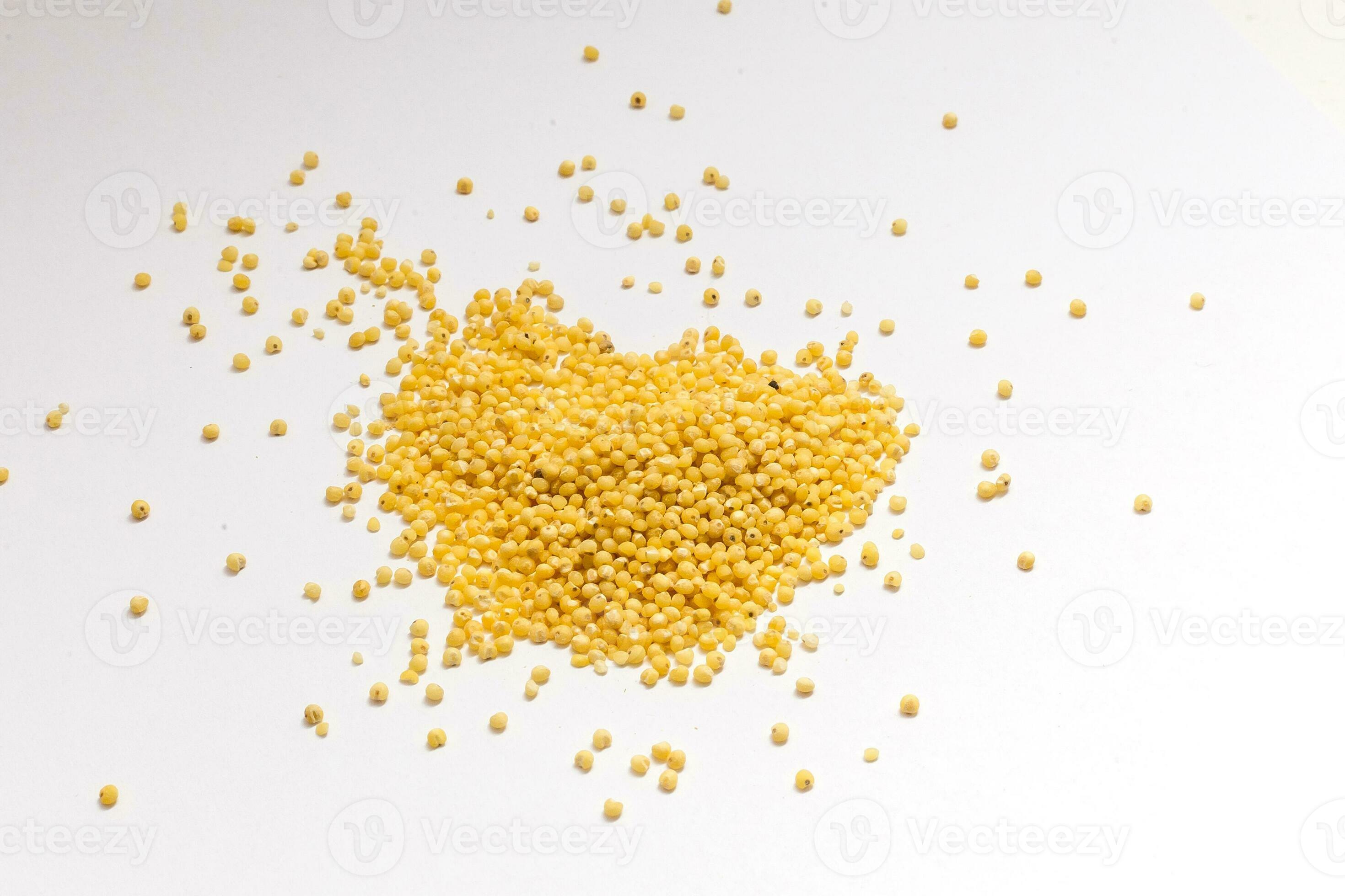 Heap of millet groats on white 34863046 Stock Photo at Vecteezy