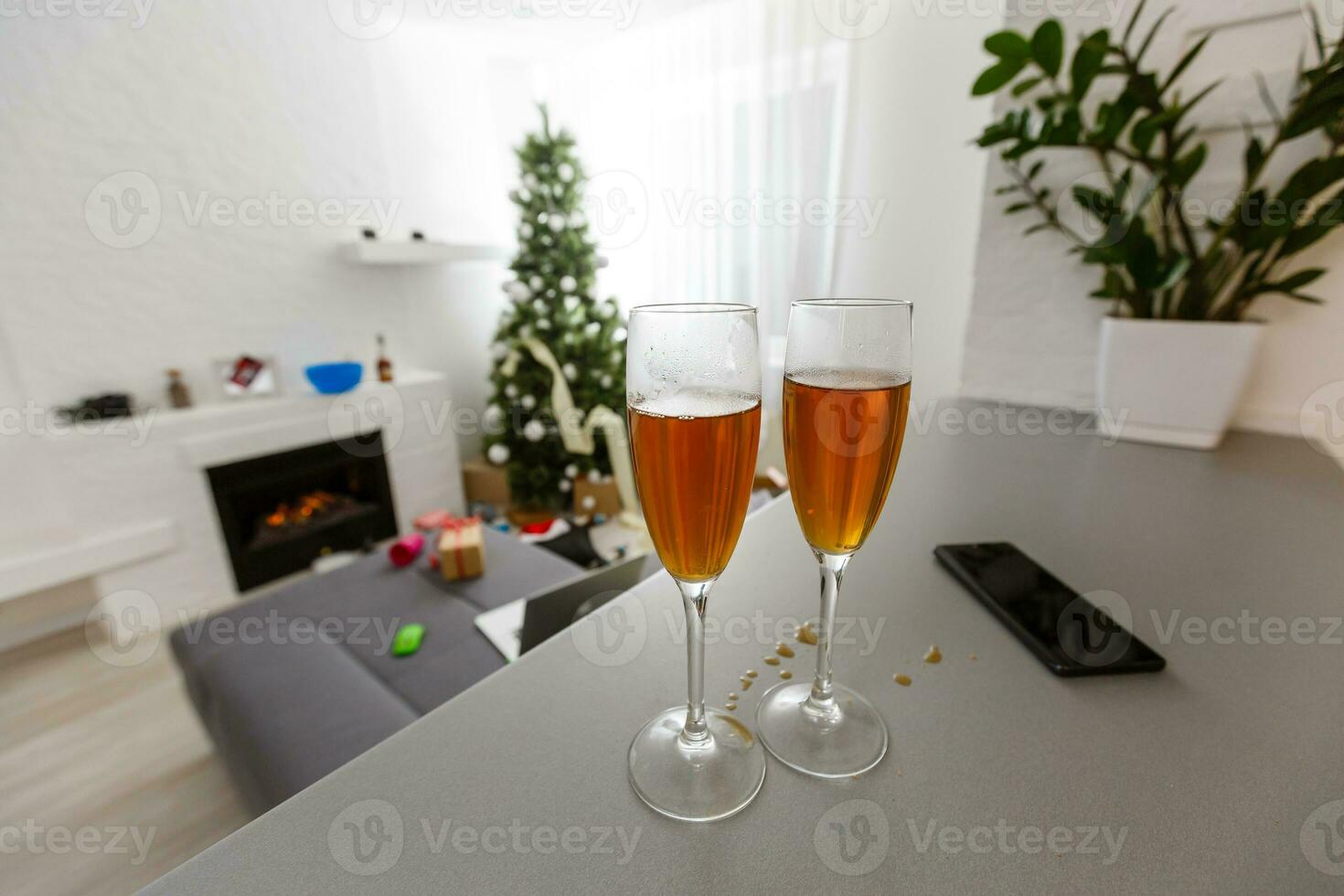 Messy living room interior with Christmas tree. Chaos after party photo