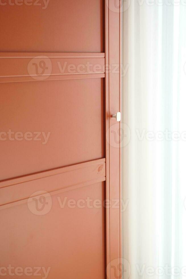opening bedroom cabinet door at home photo