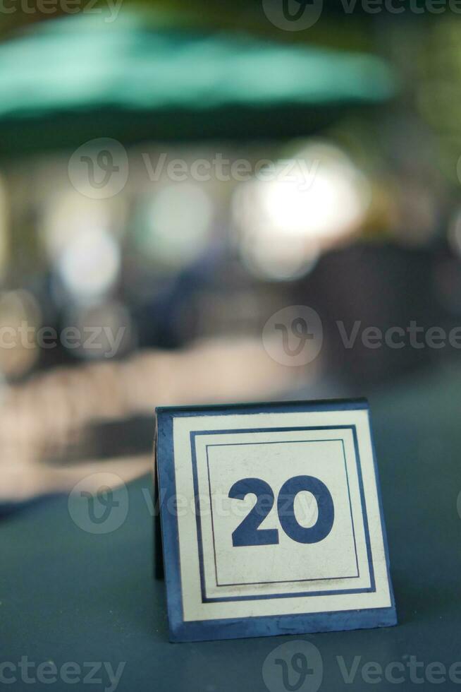 14 number sign number on cafe table . photo