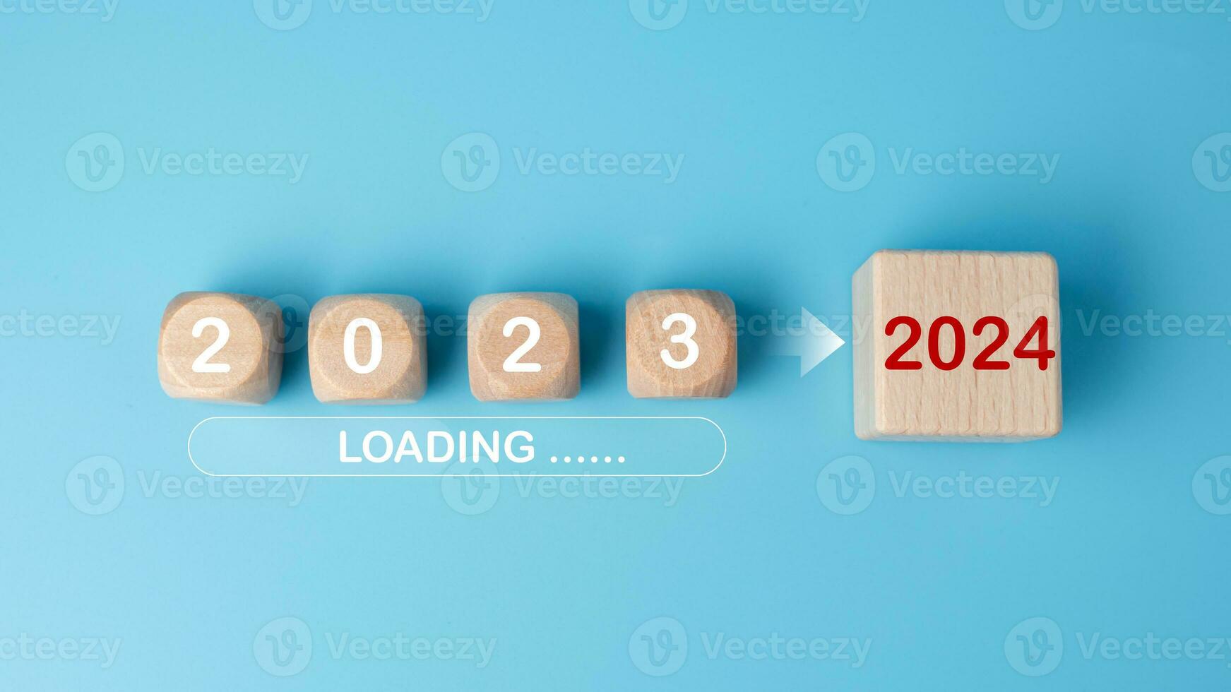 Wooden blocks lined up with the letters 2023. Represents the goal setting for 2024, the concept of a start. financial planning development strategy business goal setting photo