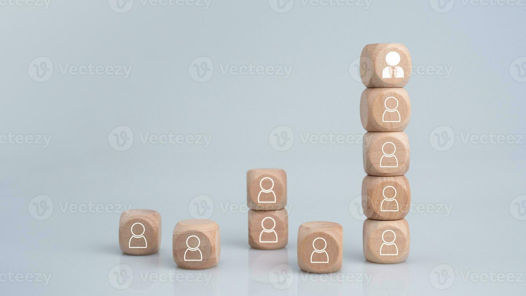 The HRM concept represents leadership and team leadership. One wooden block is different and stands out from the group. photo