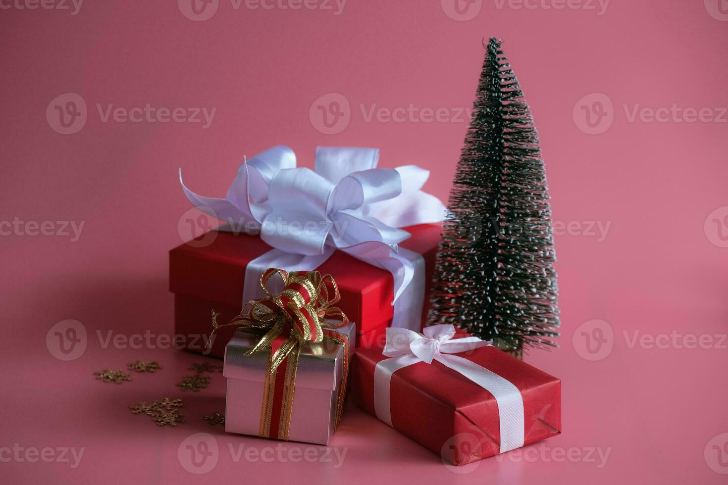 Gift box on pink background. Christmas's day concept. Planning scheduling agenda, Event, organiser x'mas day. Flat lay, top view. photo
