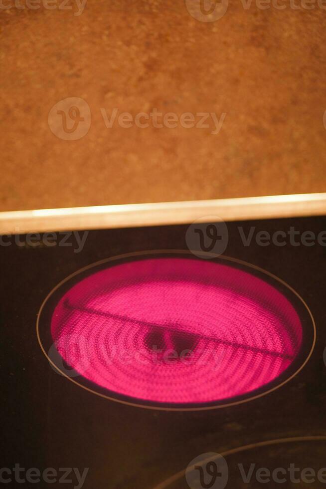 close up of ceramic black induction stove photo