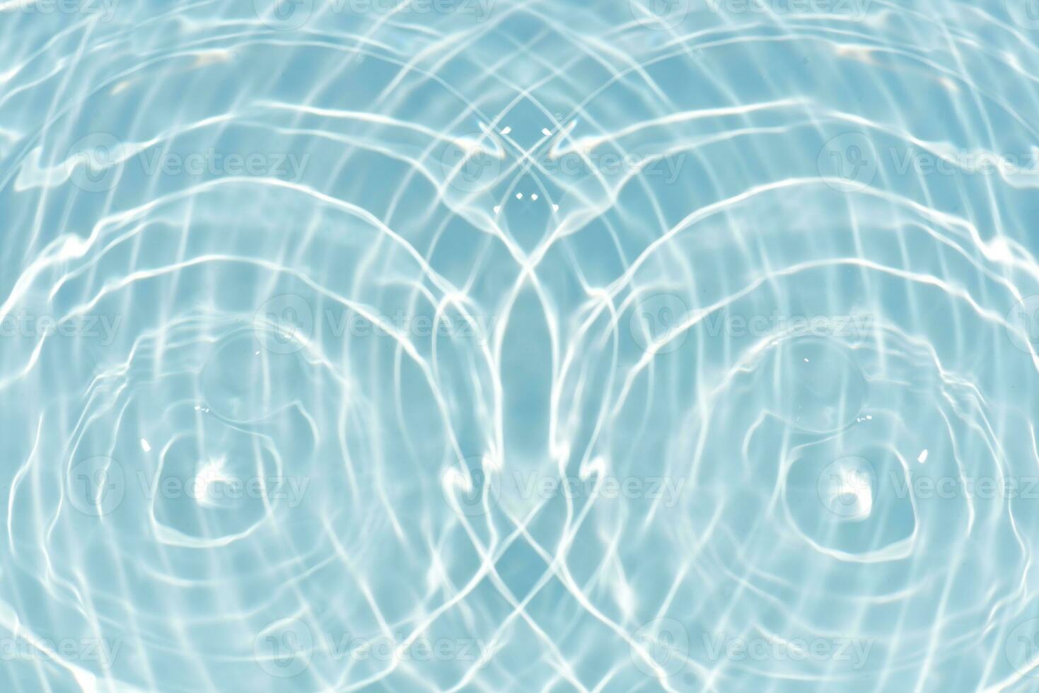 Blue water with ripples on the surface. Defocus blurred transparent white-black colored clear calm water surface texture with splash and bubbles. Water waves with shining pattern texture background. photo