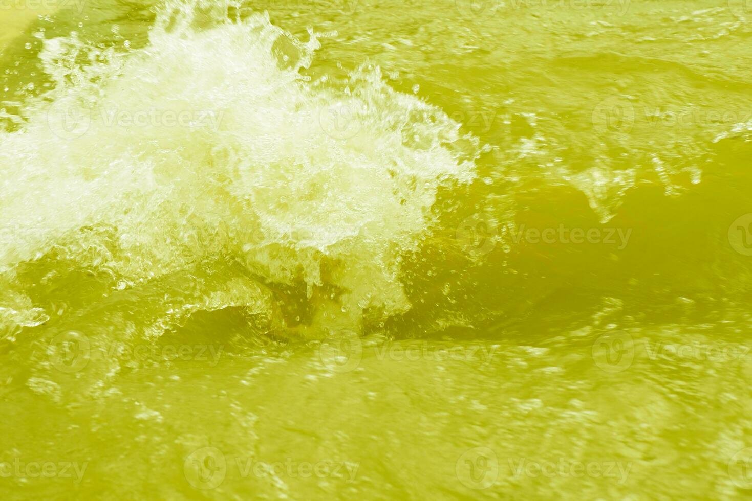 Blue water with ripples on the surface. Defocus blurred transparent white-black colored clear calm water surface texture with splash and bubbles. Water waves with shining pattern texture background. photo