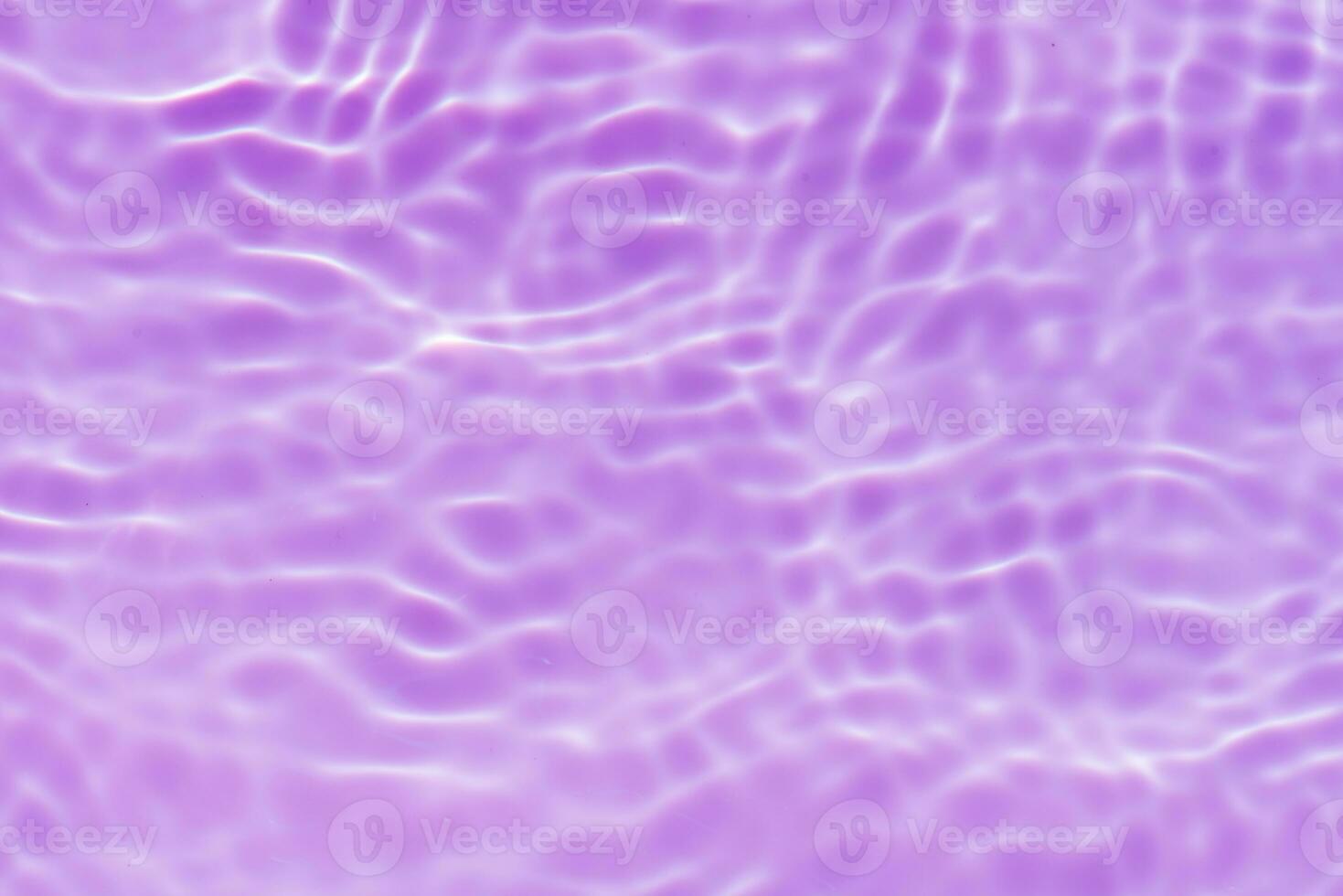 Defocus blurred transparent blue colored clear calm water surface texture with splashes reflection. Trendy abstract nature background. Water waves in sunlight with copy space. Blue watercolor shine. photo