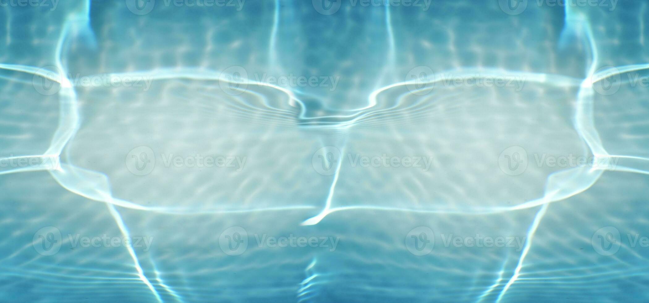 Defocus blurred transparent blue colored clear calm water surface texture with splashes reflection. Trendy abstract nature background. Water waves in sunlight with copy space. Blue watercolor shine. photo