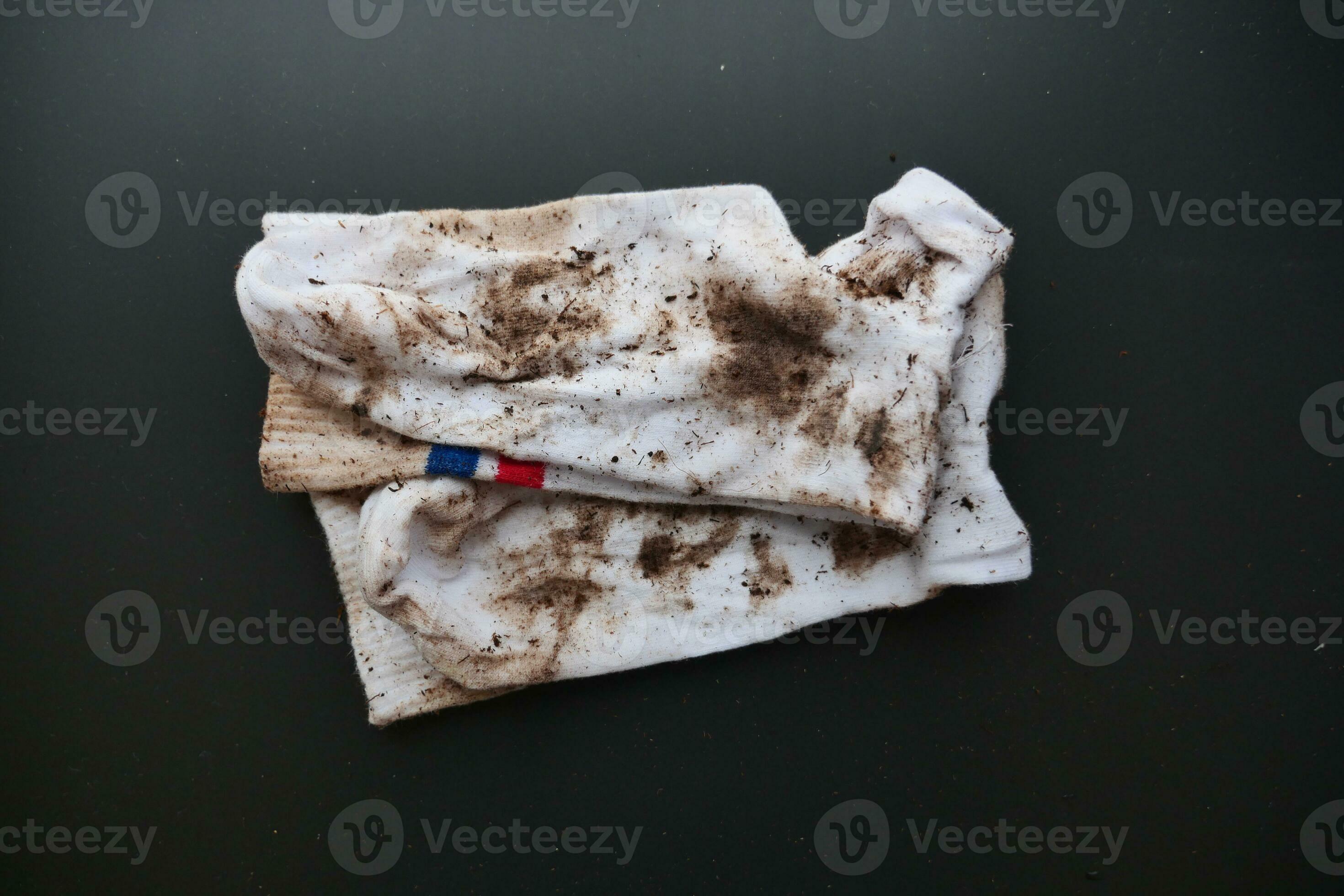 men dirty socks on black background 34867604 Stock Photo at Vecteezy