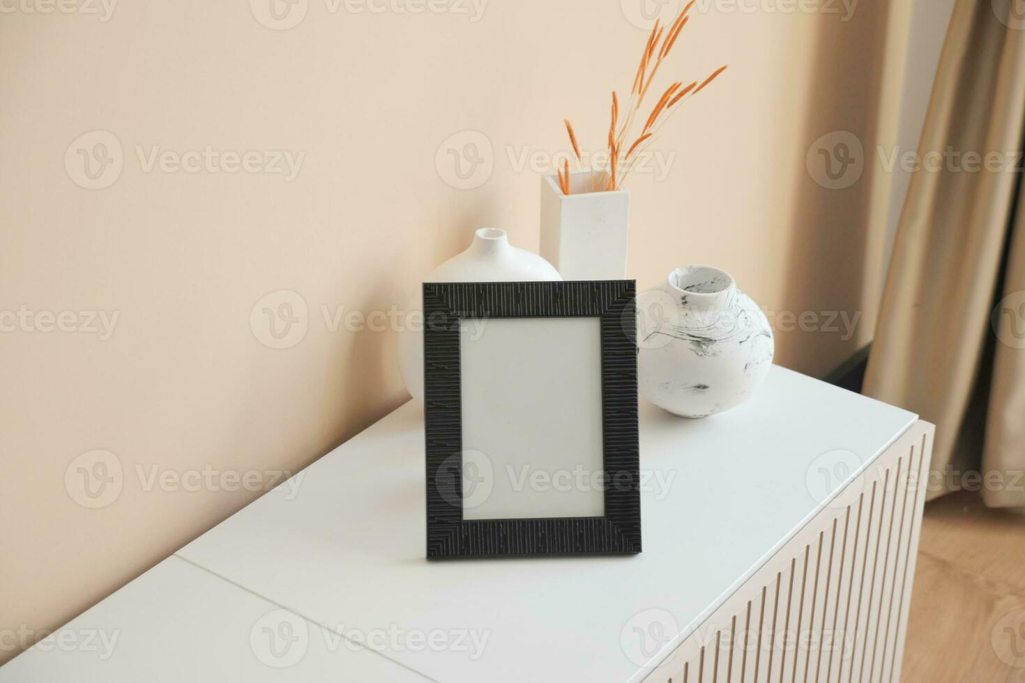 Frame on table in room photo