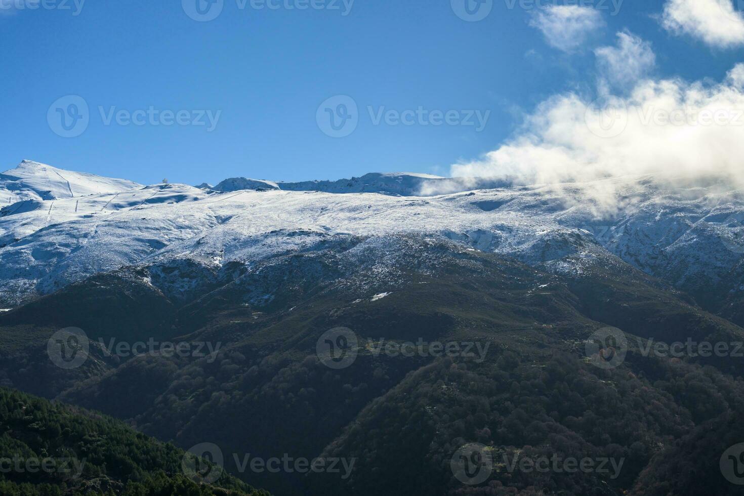 sierra nevada, snowy mountains,  village ski resort Granada photo