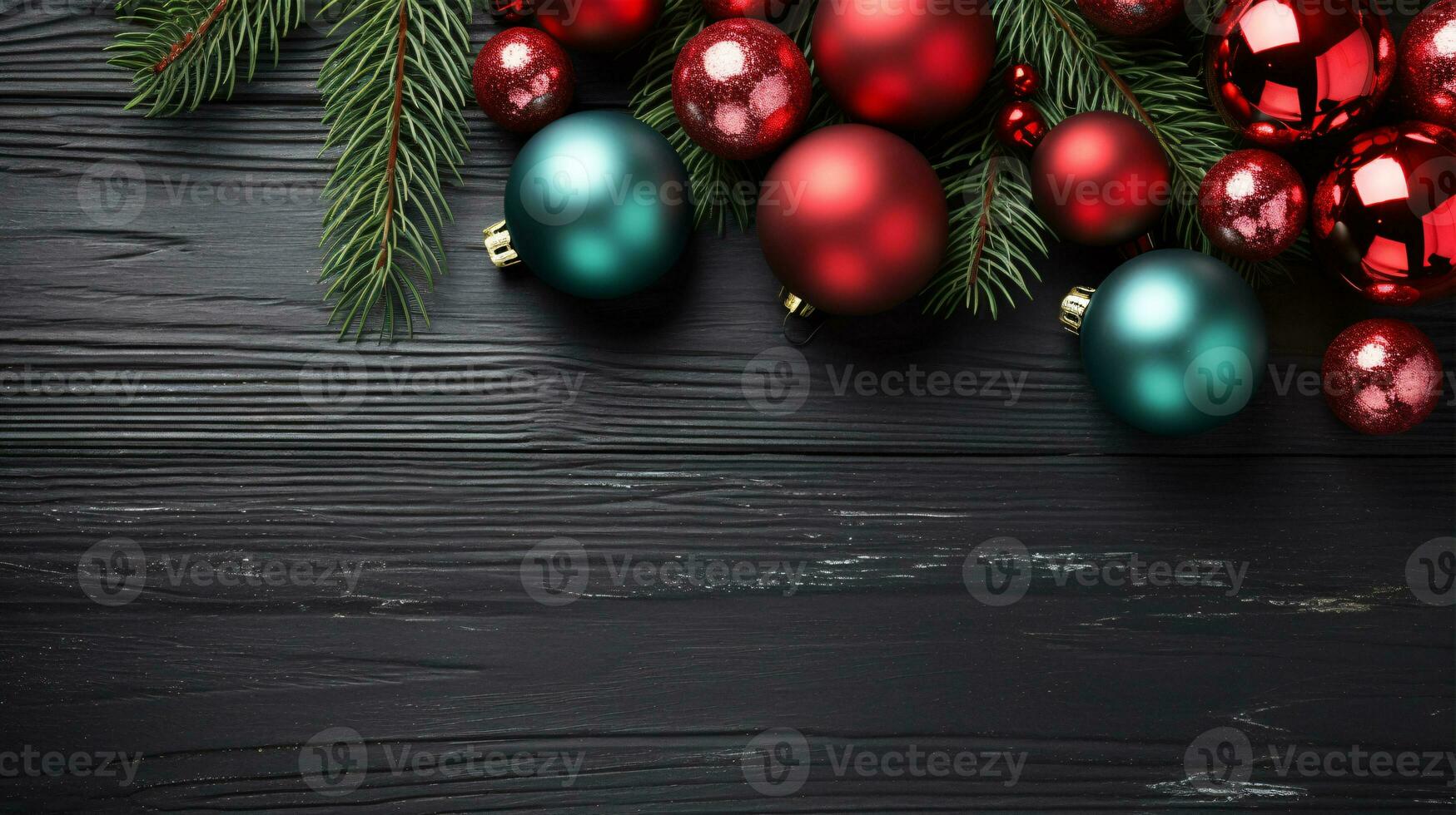 A festive, wintery scene of fir branches, red and green adornments on a dusky background in a flat, bird's-eye view. photo