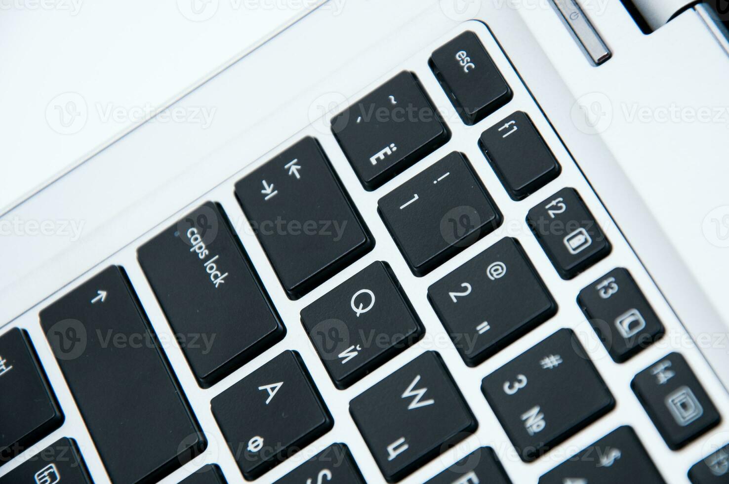 Part of a laptop keyboard on a white background photo