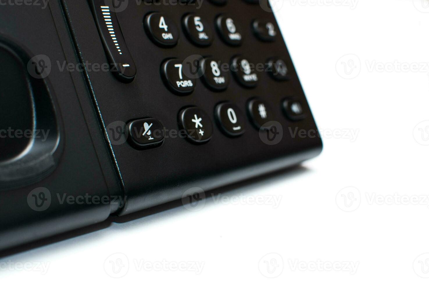 Black deskphone on the white background photo