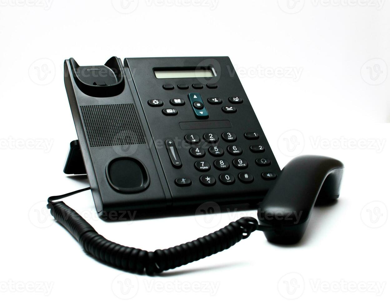 Black deskphone on the white background photo