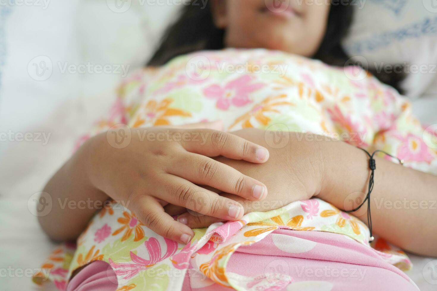 a child sleeping in bed, selective focus . photo