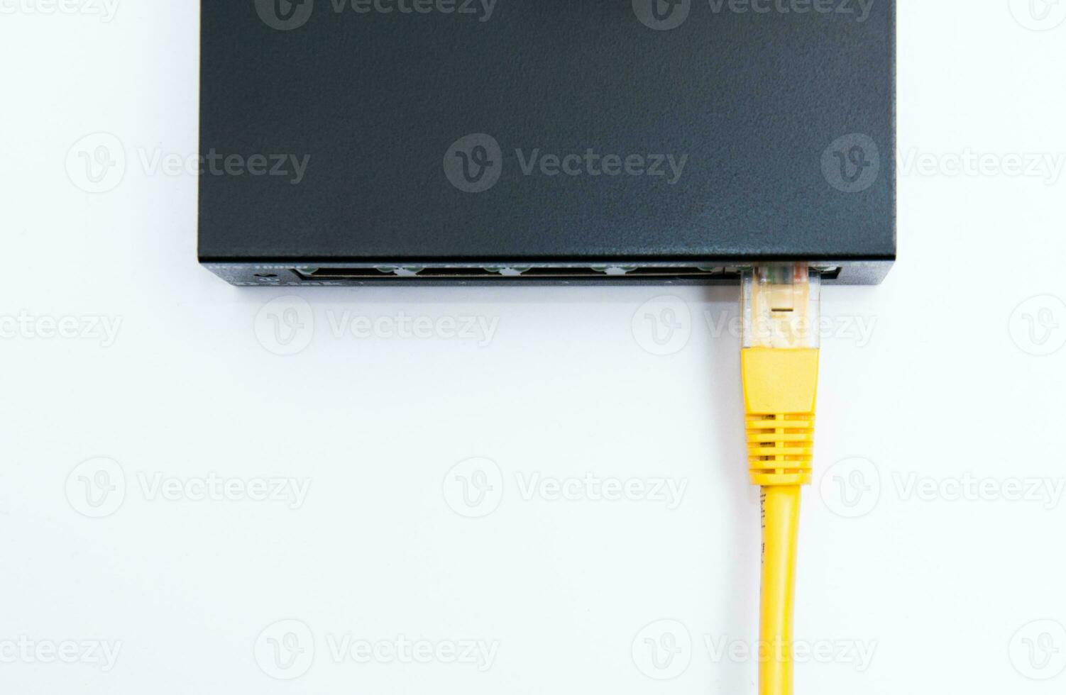 Yellow cable connected to the router photo