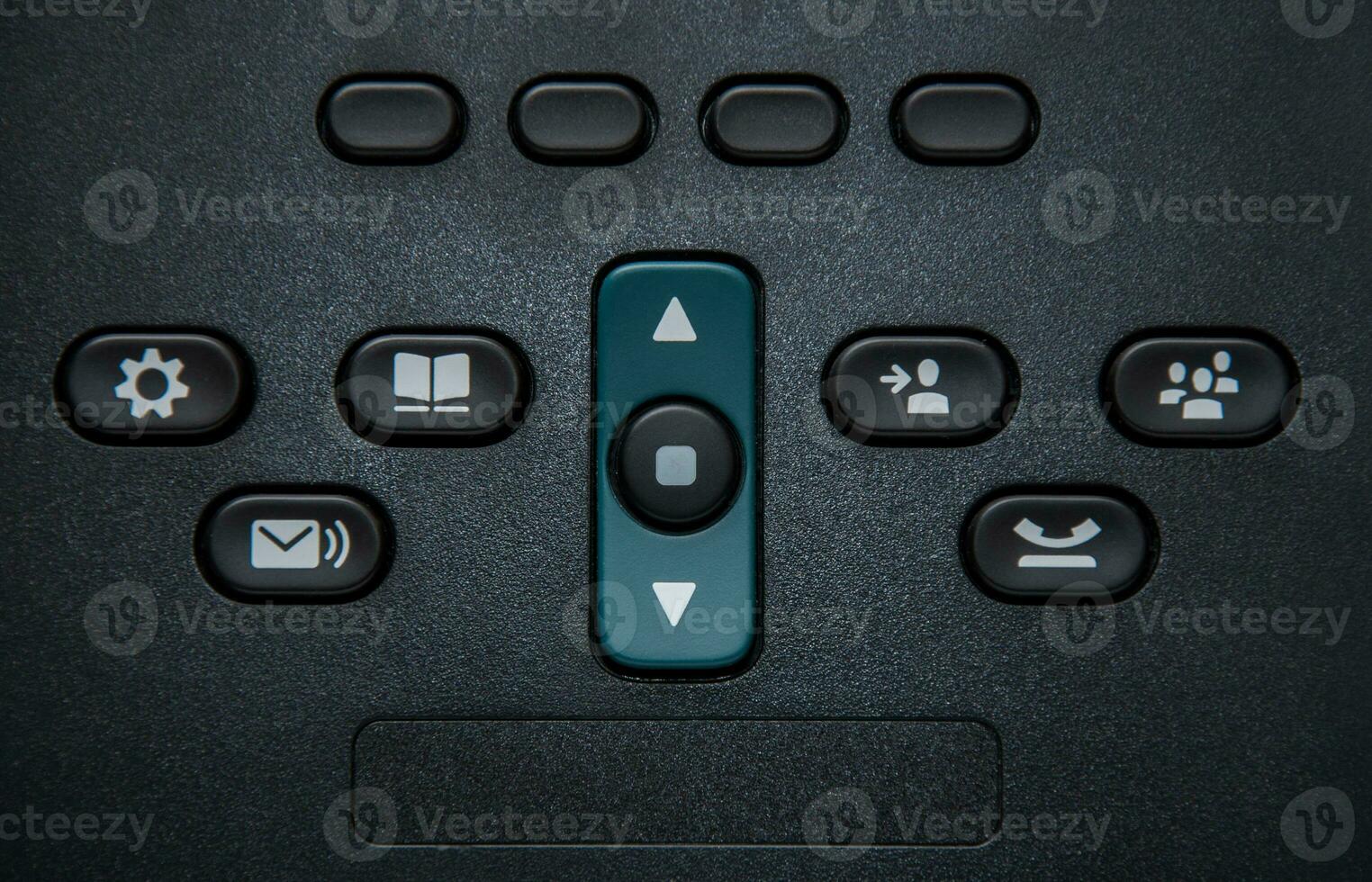 Buttons on a black desk phone photo