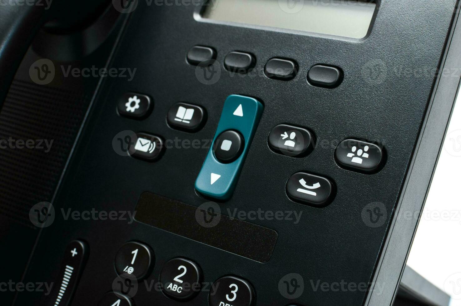 Black deskphone on the white background photo